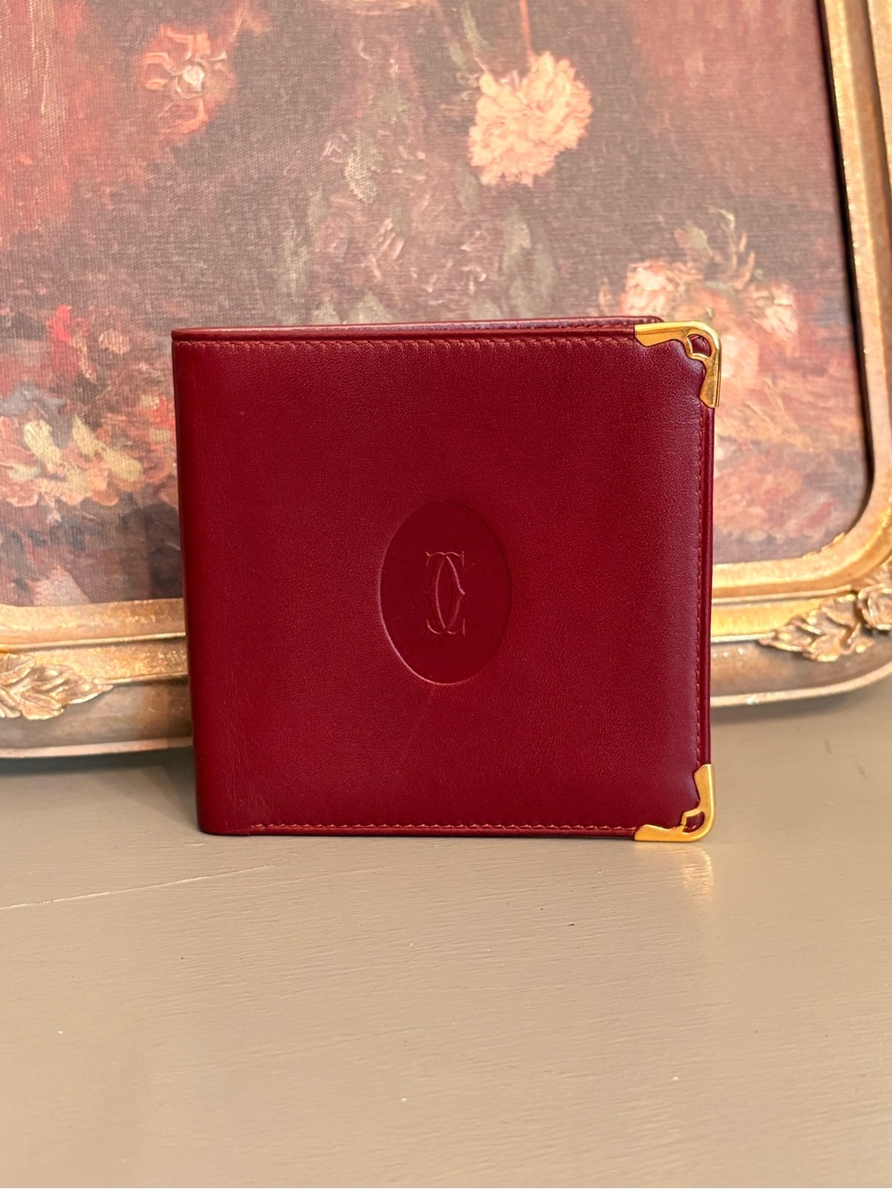 Cartier Burgundy Leather Men's Wallet with Gold Corner Accents